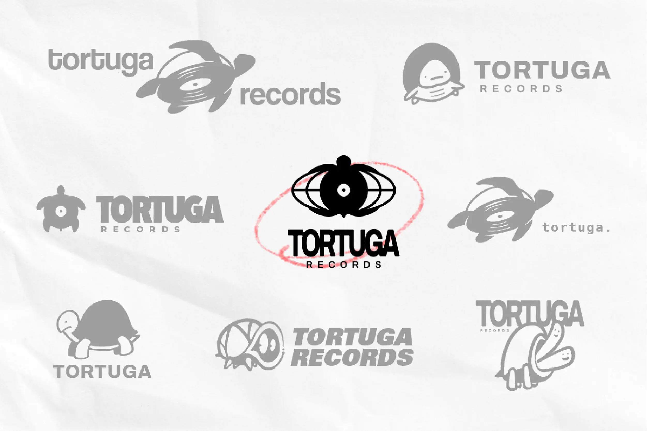 Logo exploration grid with selected mark circled